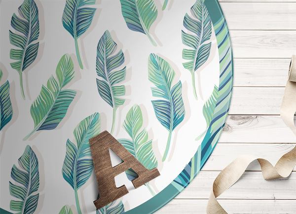 Tapis vinyle rond feuilles tropicales